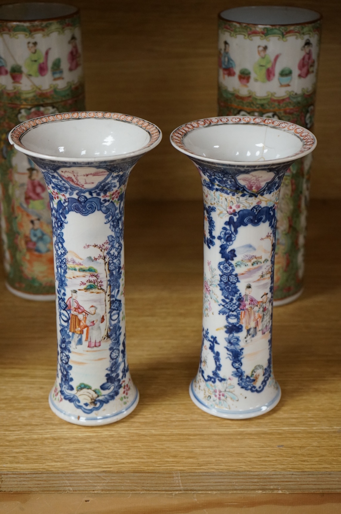 A pair of 18th century Chinese famille rose sleeve vases, a pair of 19th century Canton pattern vases and two English spill vases (6), tallest 25cm
